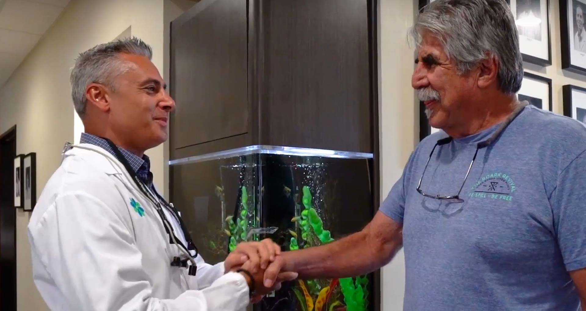 A clinician greeting a patient at Implants 4 Life